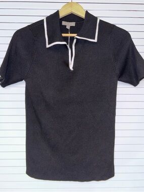 Evolution Women’s Black Knit Polo Shirt with White Trim